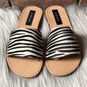 Woman’s aqua sandals